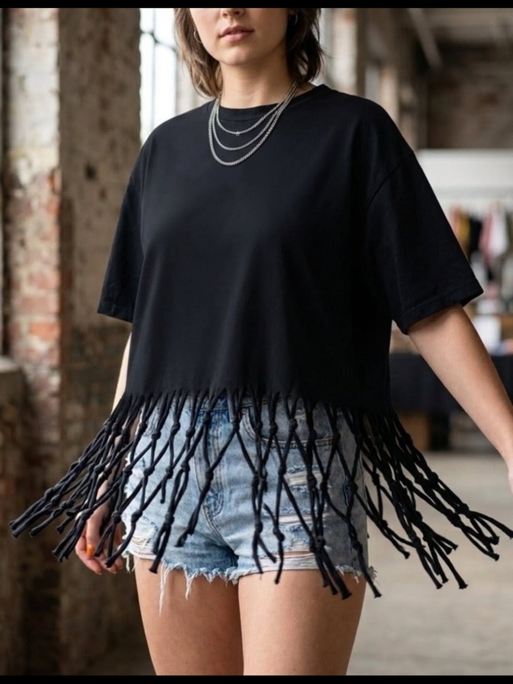 Black Fringe Hem Short Sleeve Top